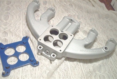 Mopar Offenhauser intake manifold in Blasted Aluminum with Manhattan Blue adapter plate