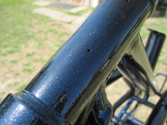 Suzuki drag bike frame close up in Blue Explosion over Black Pearl